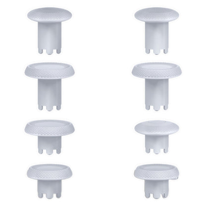Acht weisse austauschbare Controller-Thumbsticks in verschiedenen Höhen